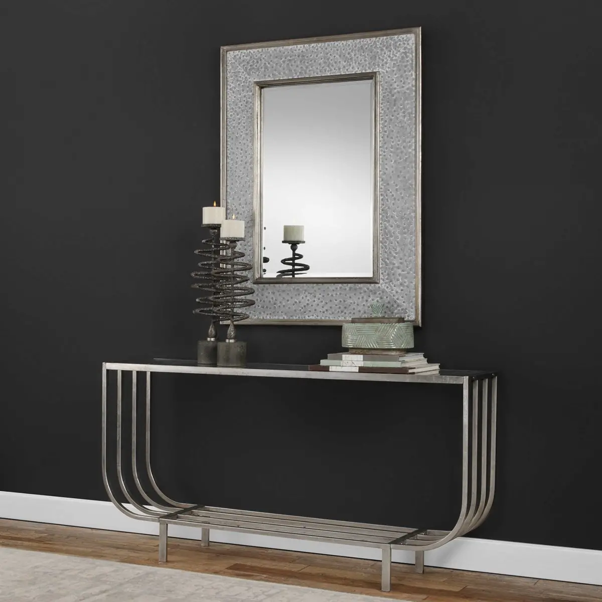 Dark gray wall big mirror and metal table